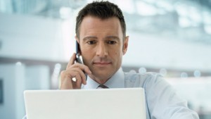 Insurance agent at computer